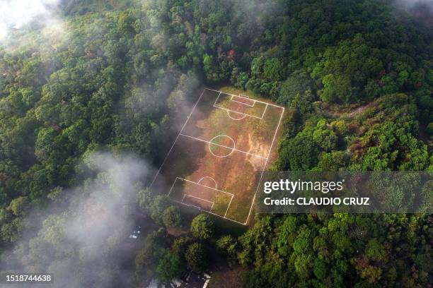 Aerial view of a football field at the Teoca volcano crater in the town of Santa Cecilia Tepetlapa, on the outskirts of Mexico City, taken on July 9,...