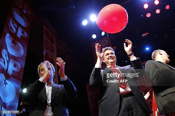 Leader of the Dutch Socialist Party Emile Roemer applauds at his party's elections evening in the Hague on September 12, 2012. Dutch voters...