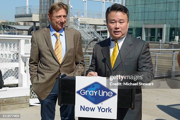 Joe Namath and David Chien attend Gray Line New York's Ride of Fame campaign at Pier 78 on September 12, 2012 in New York City.