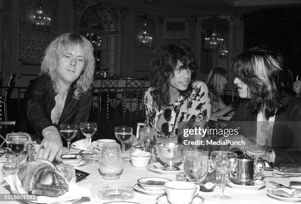 Steven Tyler with Tom Hamilton and Joe Perry of Aerosmith at the press conference before the premiere of Sgt. Pepper's Club Band at the Beverly...