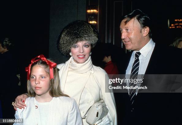 Kay Collins Rivas Joan Collins with Katyanna Kass and Ron Kass during 1983 Young... News ...