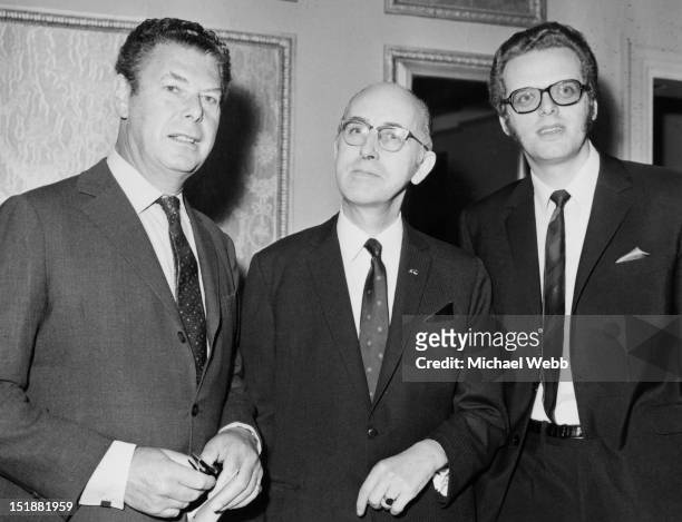 British theatrical agents Billy Marsh , Dennis Van Thal and Michael Grade at a reception at the Cafe Royal, London, to mark their acquisition of the...