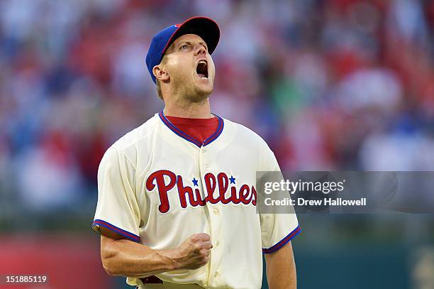 Closing pitcher Jonathan Papelbon of the Philadelphia Phillies celebrates a save after defeating the Miami Marlins 3-1 at Citizens Bank Park on...