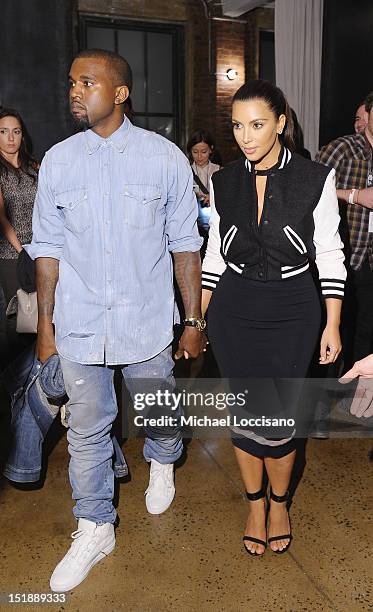 Personality Kim Kardashian and Rapper Kanye West attend Louise Goldin Spring 2013 at Milk Studios on September 12, 2012 in New York City.