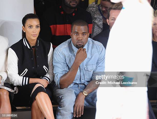 Personality Kim Kardashian and Rapper Kanye West attend Louise Goldin Spring 2013 at Milk Studios on September 12, 2012 in New York City.