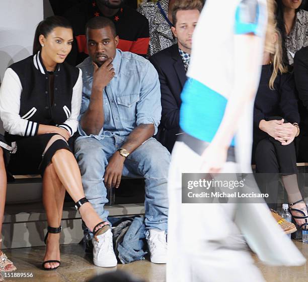 Personality Kim Kardashian and Rapper Kanye West attend Louise Goldin Spring 2013 at Milk Studios on September 12, 2012 in New York City.