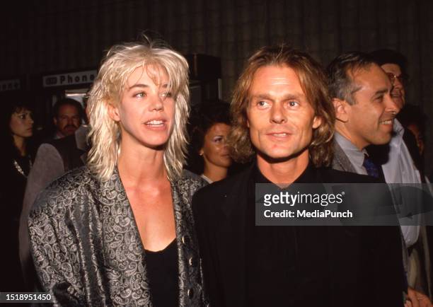 Carrie Hamilton and Michael Des Barres at the premiere of Sweet Hearts Dance on September 18, 1989 at the Avco Theater in Westwood, California