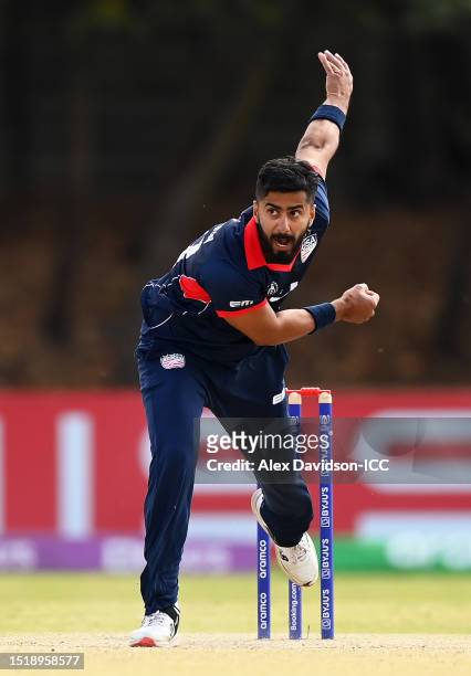 Ali Khan of USA in bowling action during the ICC Men's Cricket World Cup Qualifier Zimbabwe 2023 9th and 10th Playoff match between USA and UAE at...