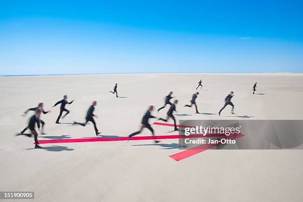 running into the same direction - one way stock pictures, royalty-free photos & images