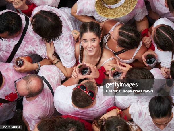 Several people during the chupinazo that kicks off the Sanfermines 2023, in the Plaza del Ayuntamiento, July 6 in Pamplona, Navarra, Spain. The...