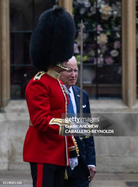 President Joe Biden inspects the Guard of Honour formed by the Welsh Guards, during a ceremonial welcome in the Quadrangle at Windsor Castle in...