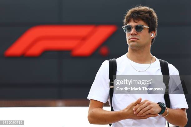 Lance Stroll of Canada and Aston Martin F1 Team walks in the Paddock during previews ahead of the F1 Grand Prix of Great Britain at Silverstone...