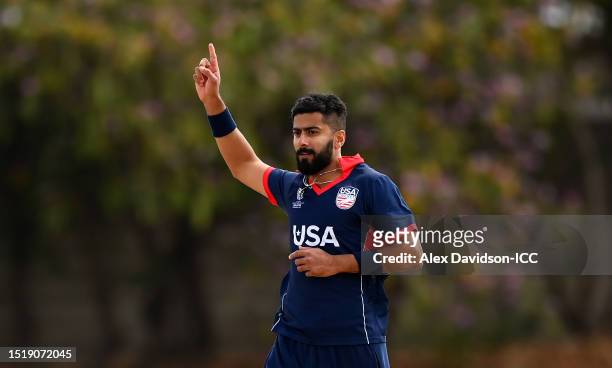 Ali Khan of USA celebrates the wicket of Rohan Mustafa of UAE during the ICC Men's Cricket World Cup Qualifier Zimbabwe 2023 9th and 10th Playoff...