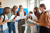 Group of teenage girls watching test results