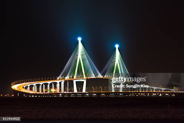 bridge with lighting on the pier - songdo ibd stock-fotos und bilder
