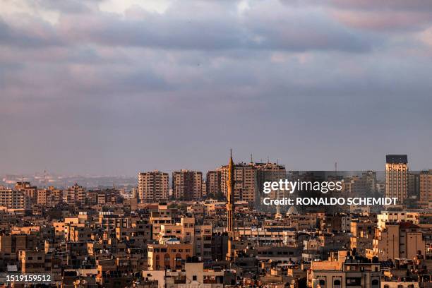 This picture taken on July 10, 2023 shows a view of the Gaza City skyline at sunset.