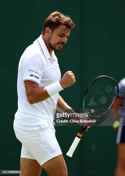 Stan Wawrinka of Switzerland celebrates against Tomas Martin Etcheverry of Argentina during day four of The Championships Wimbledon 2023 at All...