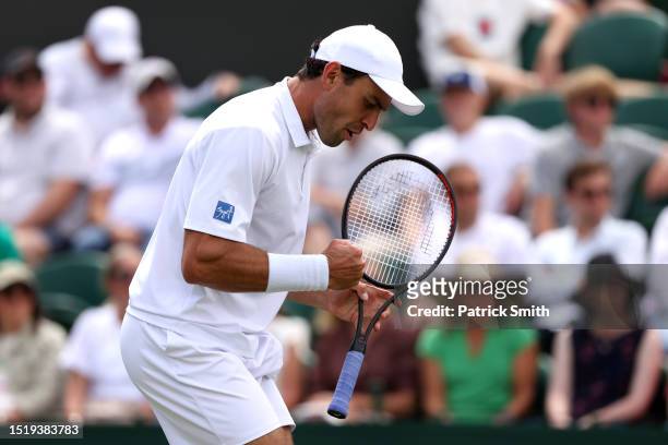 Aslan Karatsev celebrates against Andrey Rublev in the Men's Singles second round match during day four of The Championships Wimbledon 2023 at All...