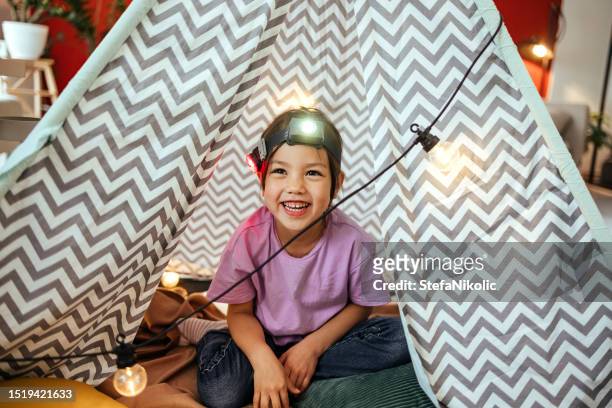 girl in a tent at home - wigwam bildbanksfoton och bilder