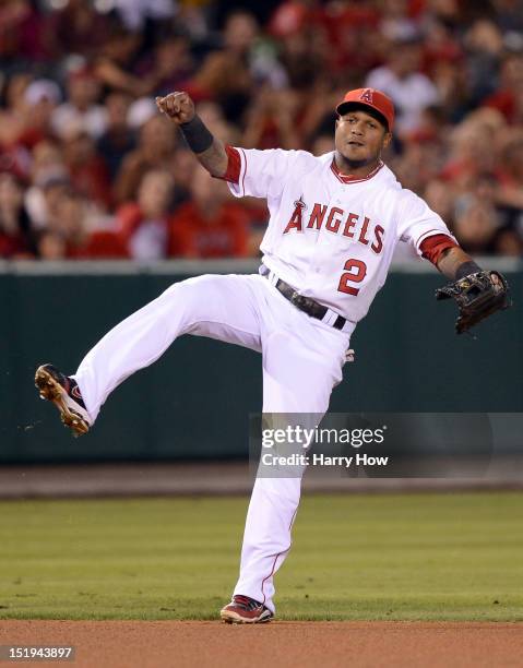 Erick Aybar of the Los Angeles reacts after his throw for an out of Cliff Pennington of the Oakland Athletics during the seventh inning at Angel...