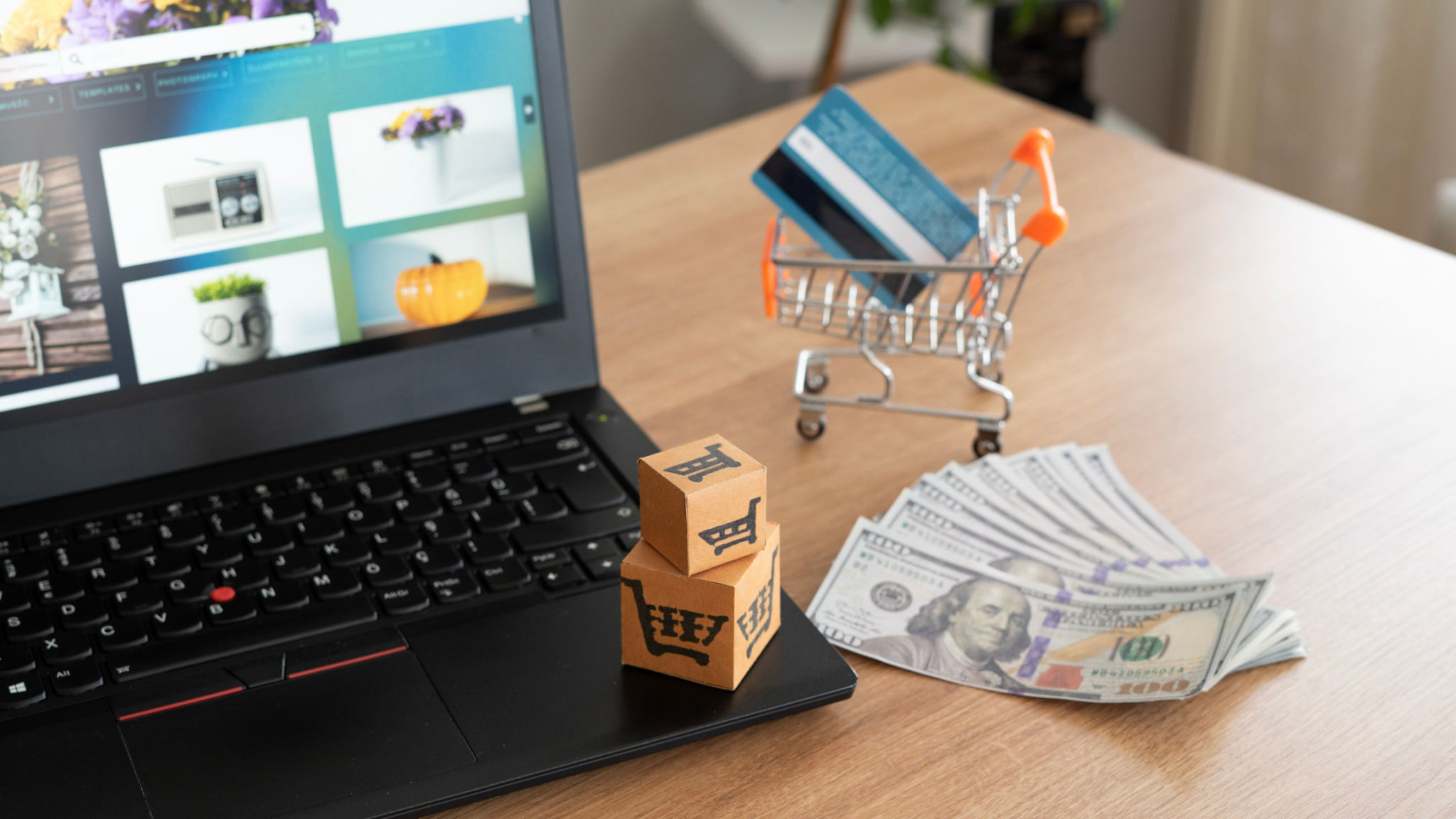 Credit card and cash on the table for online shopping Credit card and cash on the table for online shopping