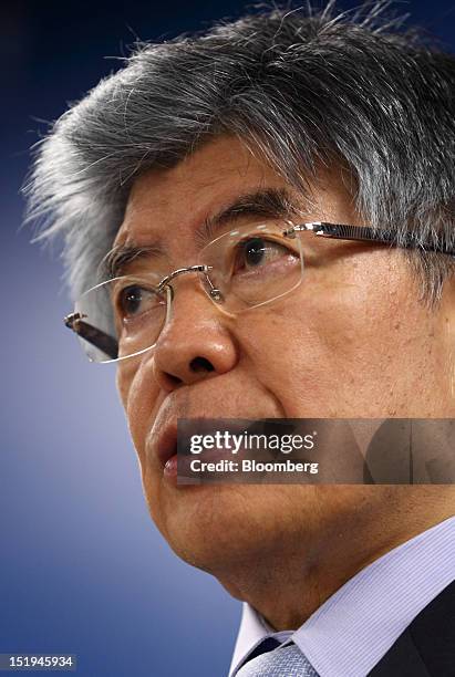 Kim Choong Soo, governor of the Bank of Korea, speaks during a news conference following a monetary policy meeting at the central bank's headquarters...