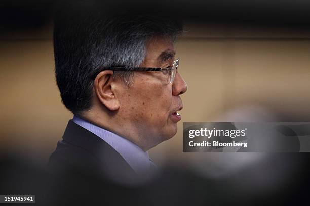 Kim Choong Soo, governor of the Bank of Korea, speaks during a news conference following a monetary policy meeting at the central bank's headquarters...