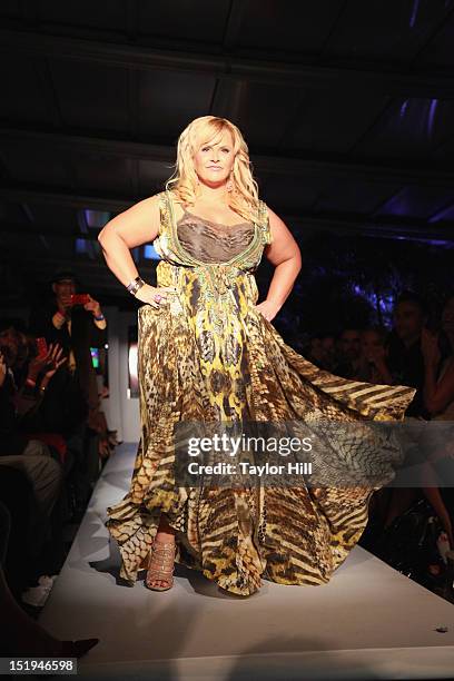 Australian television personality Ajay Rochester walks the runway during the "Real Fashion, Real Women" Runway Show Benefiting Bottomless Closetat...