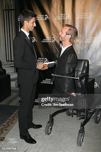 Tennis player Novak Djokovic, founder and honorary chair and author and motivational speaker Nick Vujicic attend The Novak Djokovic Foundation's...