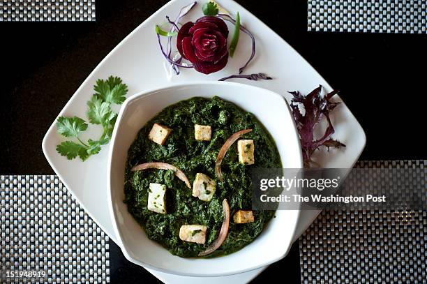 Saag Pineer -- homemade cottage cheese atop spinach puree with onions, herbs and spices -- at the Turmeric restaurant in Vienna, VA, Tuesday, July...