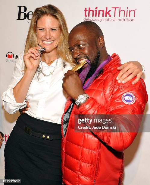 Olympian Susan Francia and recording artist Wyclef Jean attend "Forever Young" Boy Meets Girl Fashion Show during the 2013 Mercedes-Benz Fashion Week...