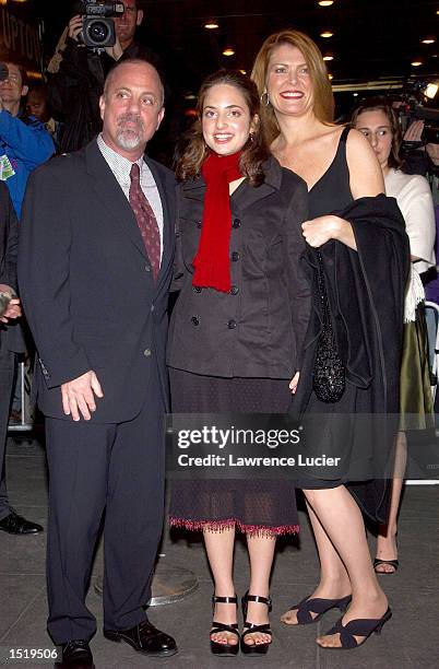 Recording artist Billy Joel, his daughter Alexa Ray, and broadcaster Trish Bergin attend the opening night of the musical, "Moving Out" on October...