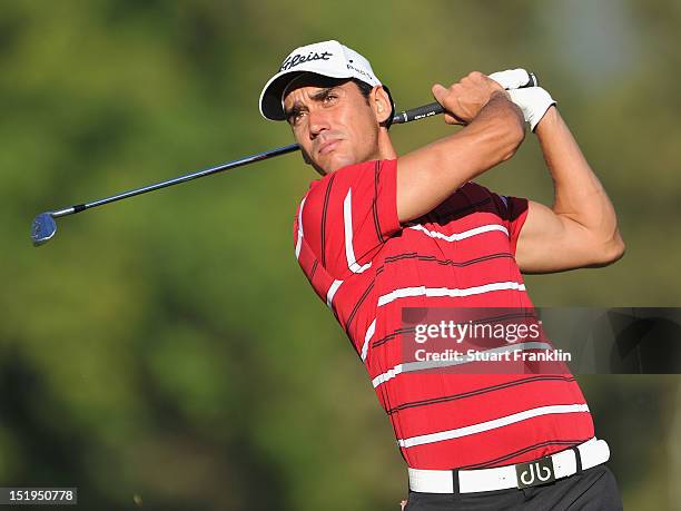 Rafael Cabrera Bello of Spain plays a shot during the first round of the BMW Italian open at Royal Park Golf & Country Club on September 13, 2012 in...