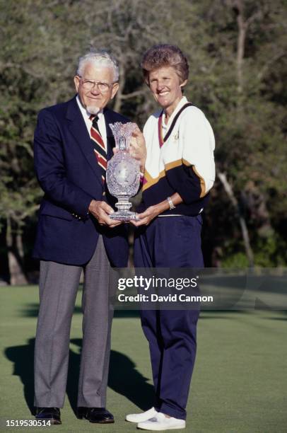 Founder of the Solheim Cup, Karsten Solheim presents Kathy Whitworth, Team Captain for the United States with the Waterford Crystal Solheim Trophy...