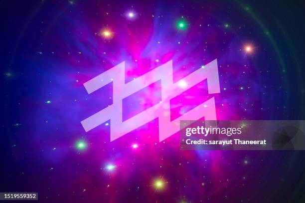 aquarius symbol on a colorful background light - wassermann-astrologisches-luftzeichen stock-fotos und bilder