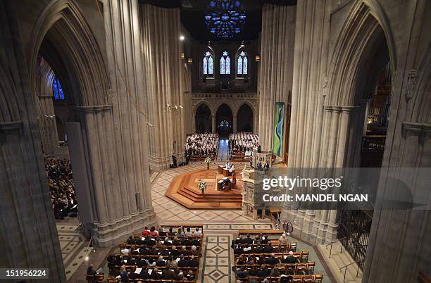 Former US Treasury Secretary John Snow speaks during a memorial for astronaut Neil Armstrong September 13, 2012 at the National Cathedral in...