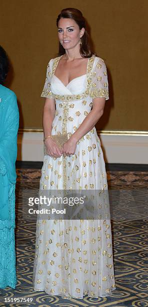 Catherine, Duchess of Cambridge attends an official dinner hosted by Malaysia's Head of State Sultan Abdul Halim Mu'adzam Shah of Kedah on Day 3 of...