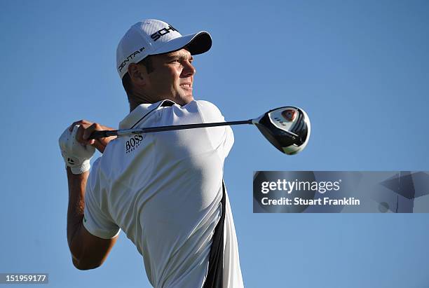 Martin Kaymer of Germany plays a shot during the first round of the BMW Italian open at Royal Park Golf & Country Club on September 13, 2012 in...
