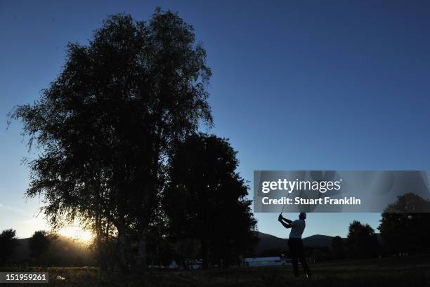 Lee Slattery of England plays a shot during the first round of the BMW Italian open at Royal Park Golf & Country Club on September 13, 2012 in Turin,...