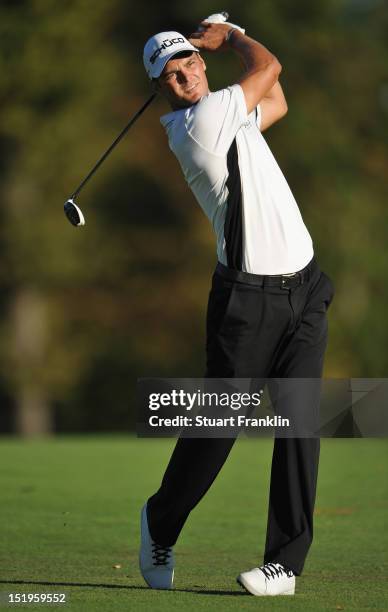 Martin Kaymer of Germany plays a shot during the first round of the BMW Italian open at Royal Park Golf & Country Club on September 13, 2012 in...