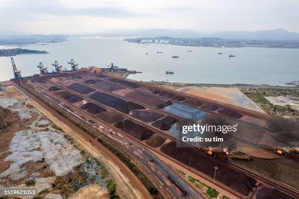 mineral raw materials stacked at freight port - ship on fire stock pictures, royalty-free photos & images
