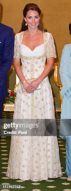 Catherine, Duchess of Cambridge attends an official dinner hosted by Malaysia's Head of State Sultan Abdul Halim Mu'adzam Shah of Kedah on Day 3 of...