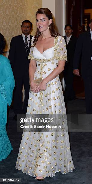 Catherine, Duchess of Cambridge attends an official dinner hosted by Malaysia's Head of State Sultan Abdul Halim Mu'adzam Shah of Kedah on Day 3 of...