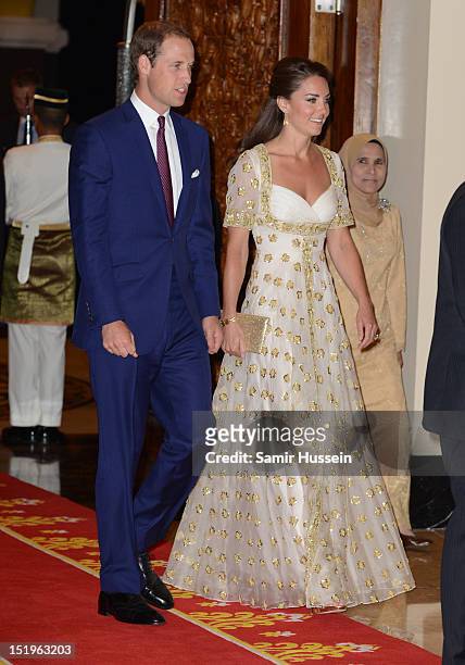 Prince William, Duke of Cambridge and Catherine, Duchess of Cambridge attend an official dinner hosted by Malaysia's Head of State Sultan Abdul Halim...