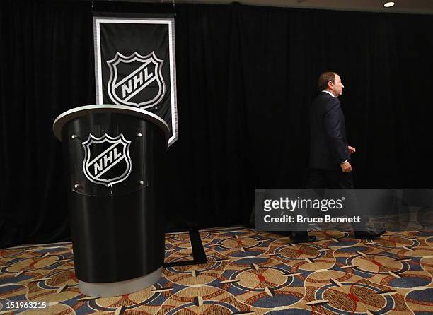 Commissioner Gary Bettman of the National Hockey League leaves the podium after addressing the media at Crowne Plaza Times Square on September 13,...