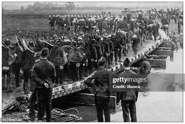antique image from british magazine: military manoeuvres, wilts and dorset, crossing pontoon bridge - pontoon boat stock illustrations