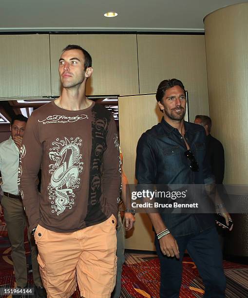 Zdeno Chara of the Boston Bruins and Henrik Lundqvist of the New York Rangers arrive for the NHLPA press conference at Marriott Marquis Times Square...