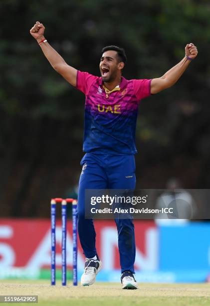 Sanchit Sharma of UAE celebrates the wicket of Ali Khan of USA to win the match during the ICC Men's Cricket World Cup Qualifier Zimbabwe 2023 9th...