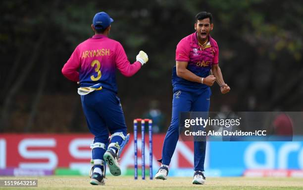 Sanchit Sharma of UAE celebrates the wicket of Ali Khan of USA to win the match during the ICC Men's Cricket World Cup Qualifier Zimbabwe 2023 9th...