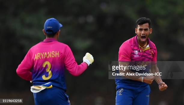 Sanchit Sharma of UAE celebrates the wicket of Ali Khan of USA to win the match during the ICC Men's Cricket World Cup Qualifier Zimbabwe 2023 9th...